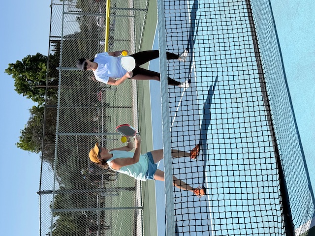 Coach Jenn giving a private lesson